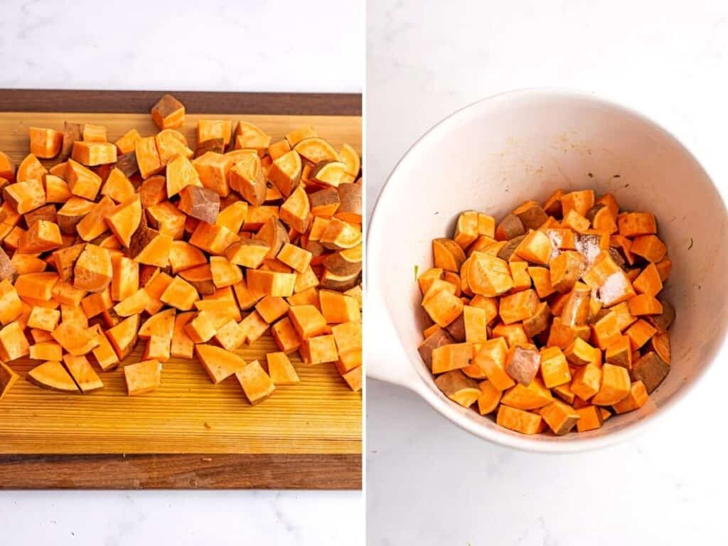 Sweet potatoes cut into cubes on a wooden chopping board.