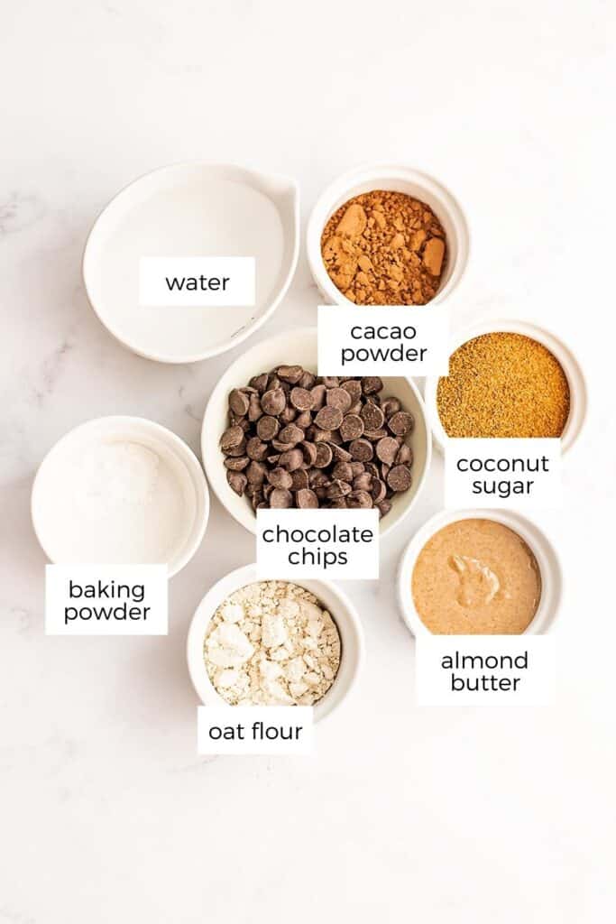 Ingredients to make oat flour brownies in ramekins.