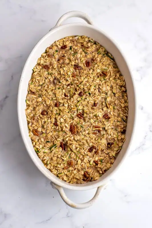 Zucchini oatmeal in casserole dish before baking
