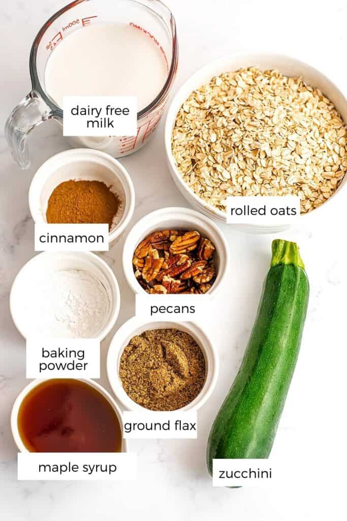 Ingredients to make zucchini baked oatmeal in ramekins.