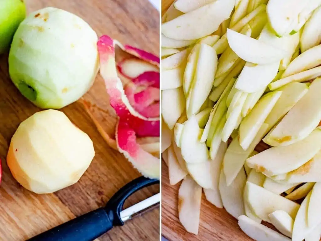 Apples peeled then sliced thin on a wooden cutting board. 