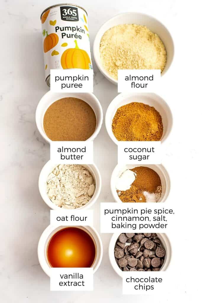 Ingredients to make gluten free pumpkin cookies in white ramekins.