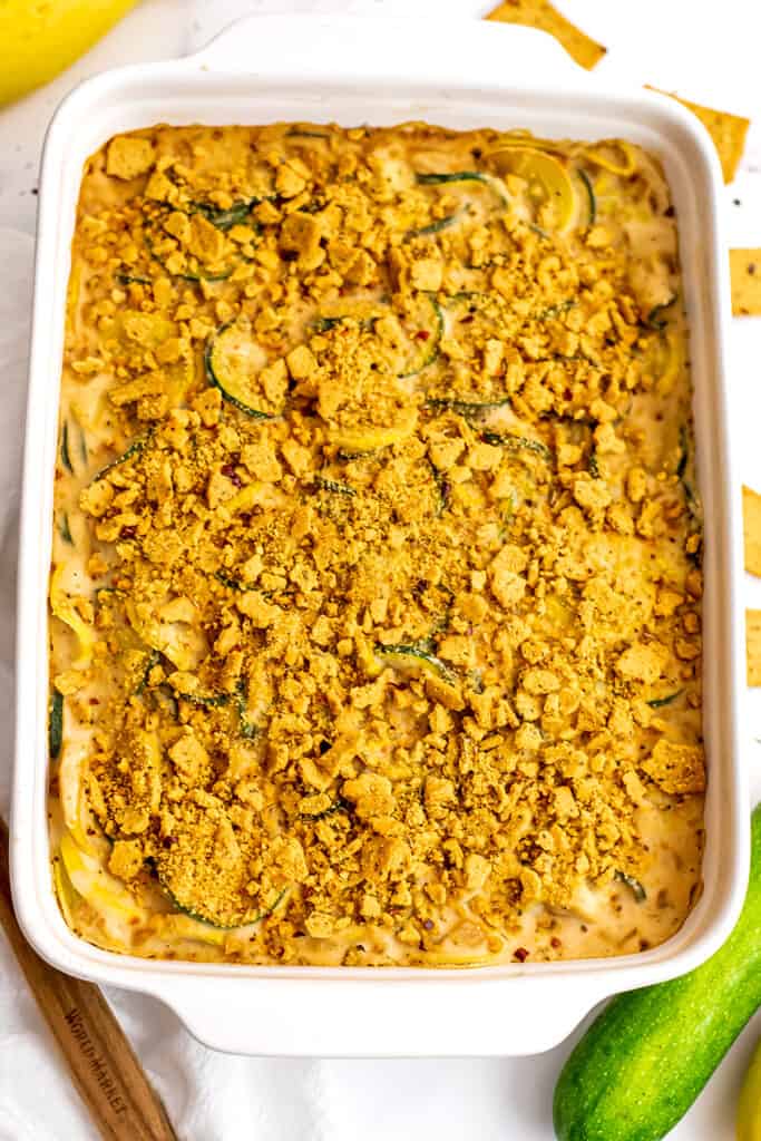 White casserole dish filled with dairy free squash casserole.