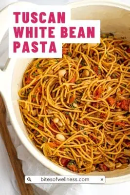 Large white pot filled with tuscan white bean pasta.