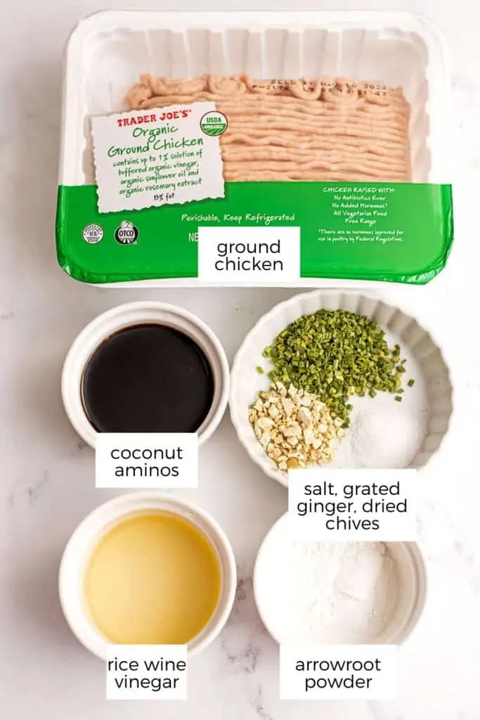 Ingredients to make ground chicken stir fry in ramekins.