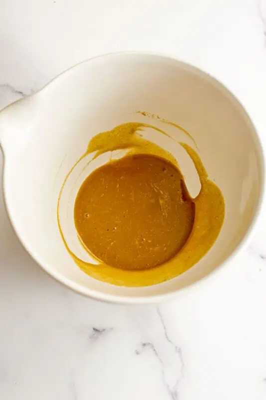 Maple dijon sauce stirred together in large mixing bowl.