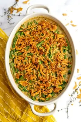 White casserole dish filled with vegan gluten free green bean casserole.