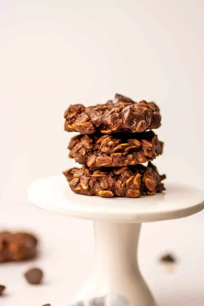 Three chocolate oatmeal cookies stacked on each other.