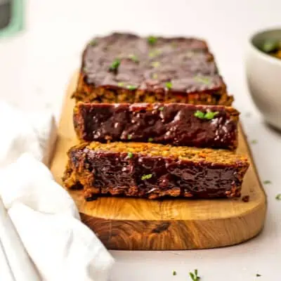 Two slices cut from vegan lentil loaf.