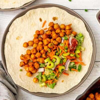 Buffalo chickpeas, lettuce and veggies on a wrap.