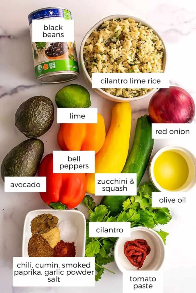 Ingredients to make vegan fajita bowls in white bowls.