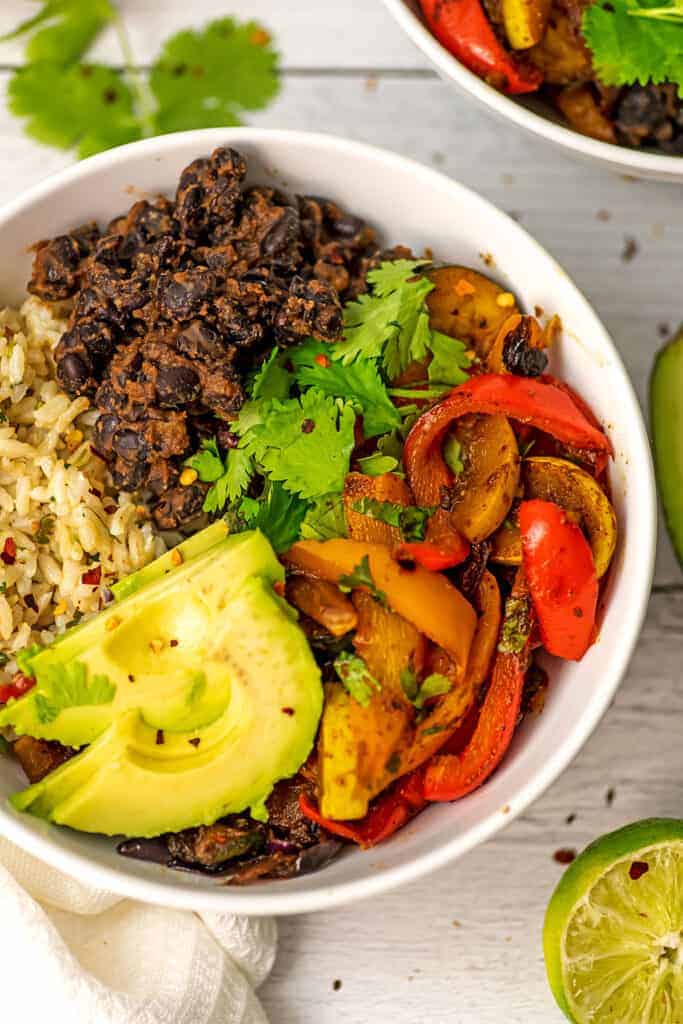 Fajita vegetables with black beans, avocado and cilantro lime rice.