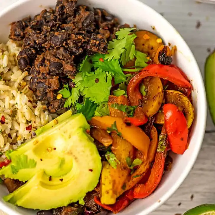 Fajita vegetables with black beans, avocado and cilantro lime rice.