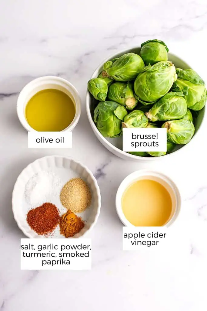 Ingredients to make air fryer smashed brussel sprouts on marble countertop.