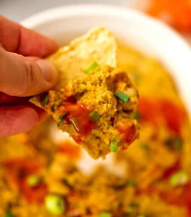Chip filled with chickpea buffalo dip.