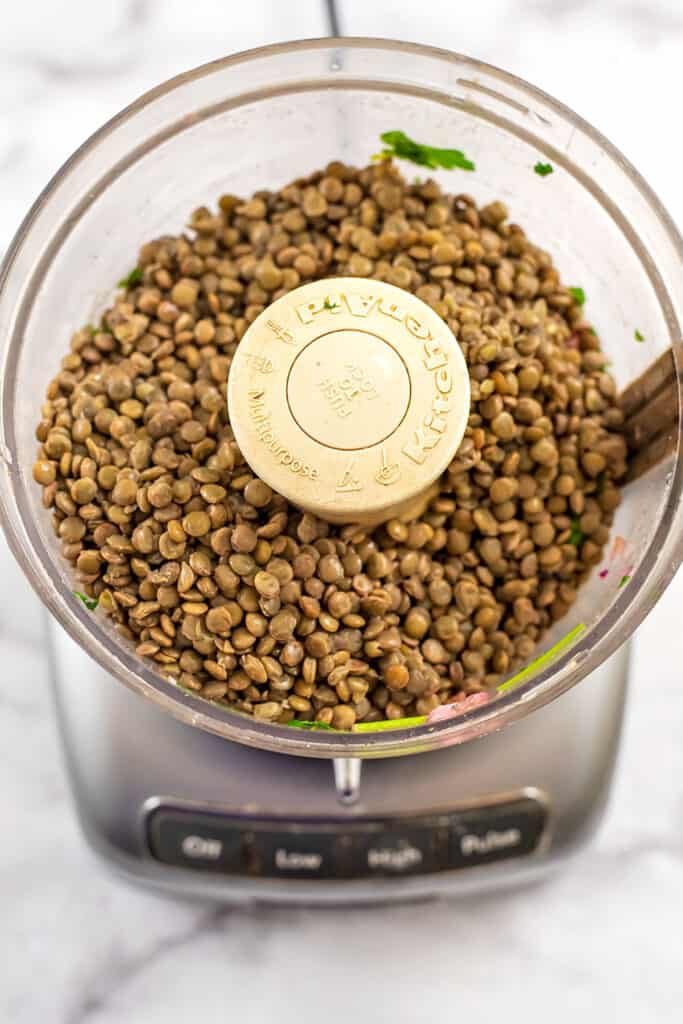 Lentils added to food processor.