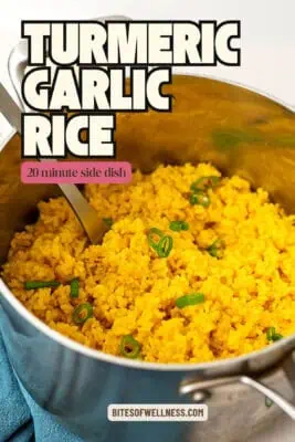 Large pot filled with turmeric garlic rice.