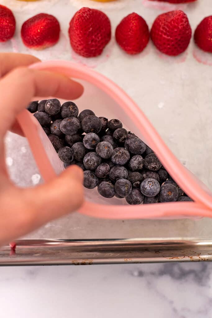 Frozen blueberries in a freezer safe stasher bag.