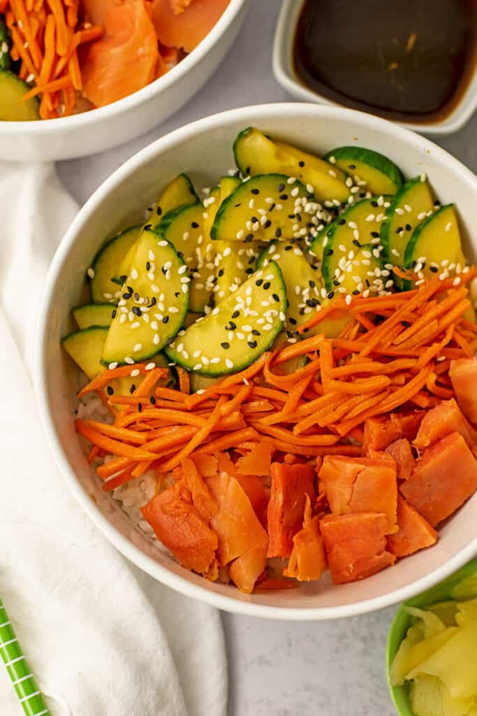 Bowl filled with smoked salmon and rice.