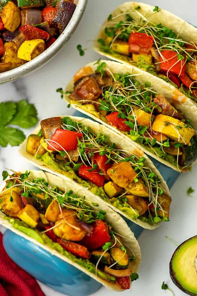 Mexican roasted vegetables in soft tacos.