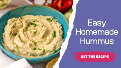 Butter bean hummus in a green bowl.