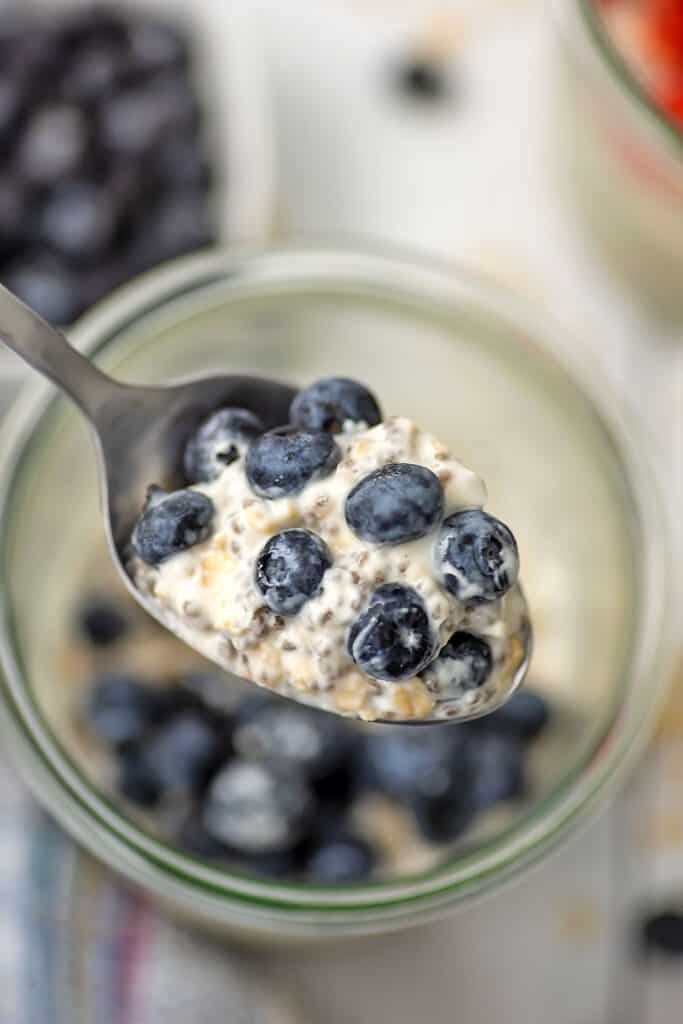 Spoonful of blueberry overnight oats with yogurt, no milk.