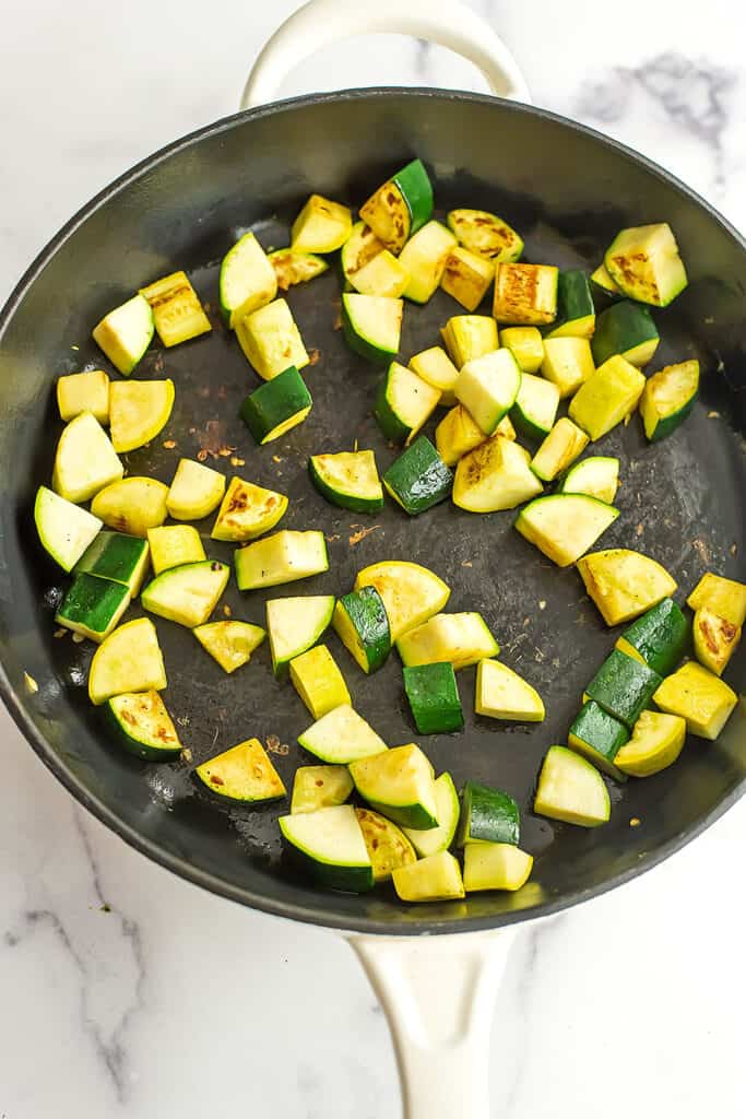 Zucchini and summer squash cooked in the skillet.