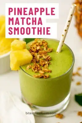 Glass filled with protein pineapple matcha smoothie.
