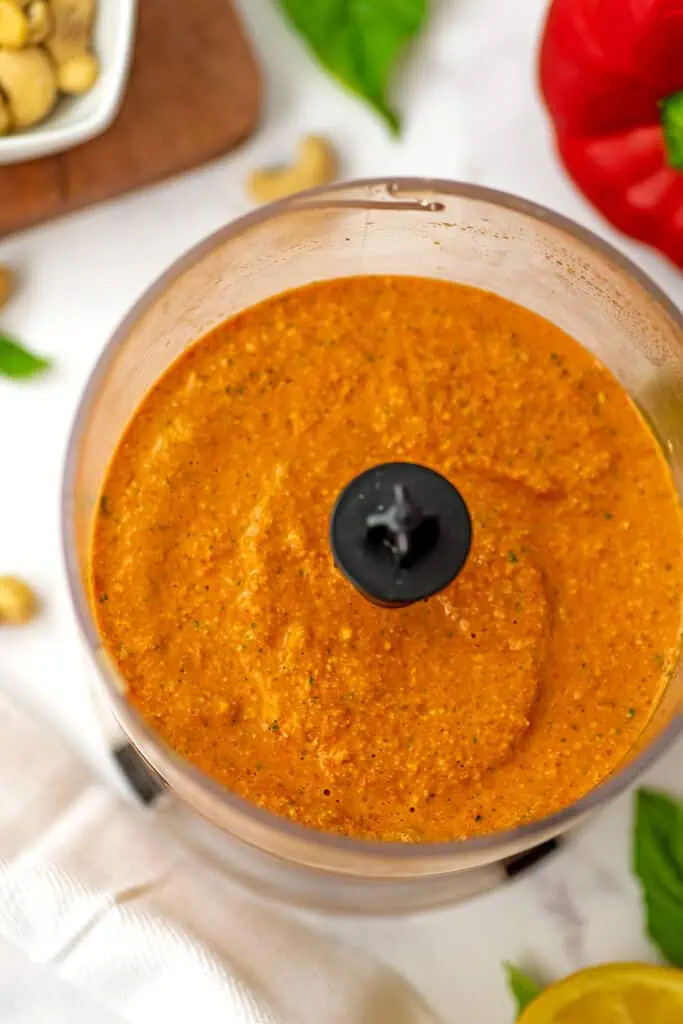 Small food processor with roasted red pepper pesto.