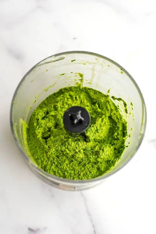 Sunflower seed pesto in food processor after blending.