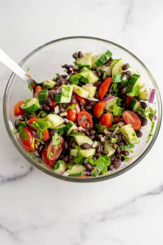 Mediterranean black bean salad stirred together.