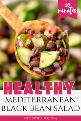 Large bowl of black bean cucumber tomato salad.