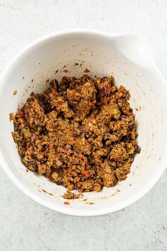 Lentil black bean mixture in white bowl.