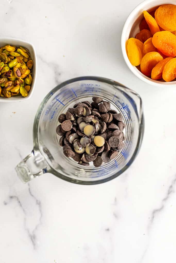 Chocolate chips in a measuring cup.