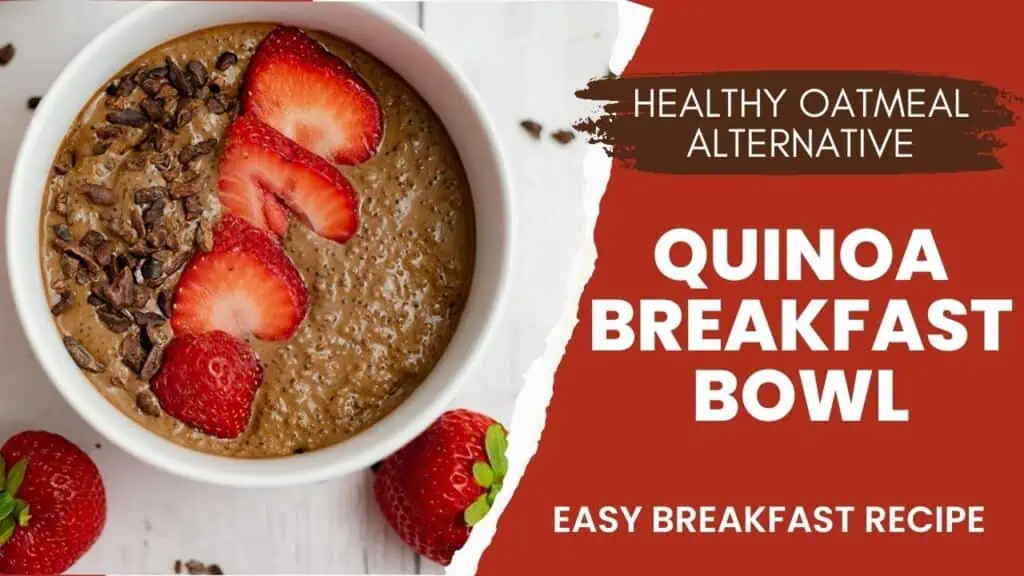 Quinoa breakfast bowl in a white bowl with sliced strawberries and cocoa nibs.