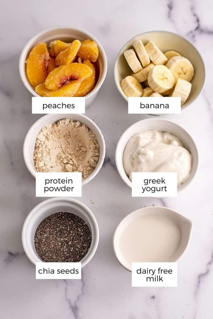 Banana peach smoothie bowl ingredients in white ramekins with ingredients labeled.