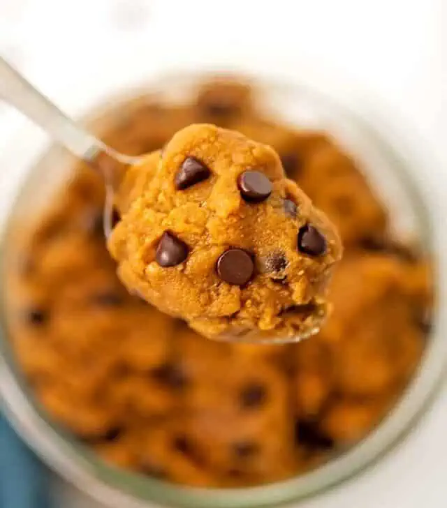 Protein cookie dough scooped out with a spoon.