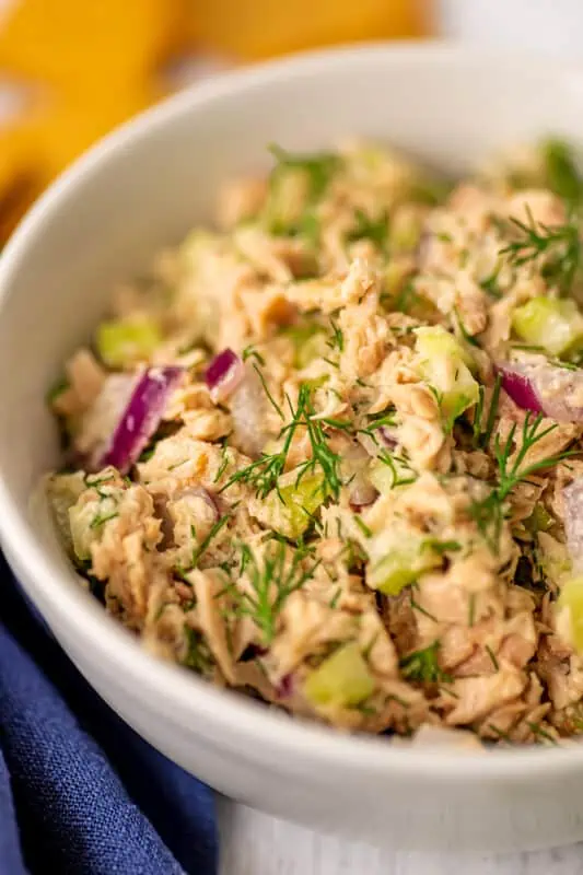 Dill tuna salad in a white bowl.