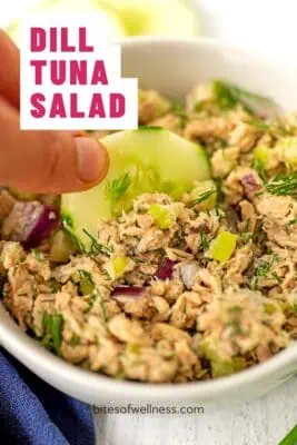white bowl filled with dill tuna salad.