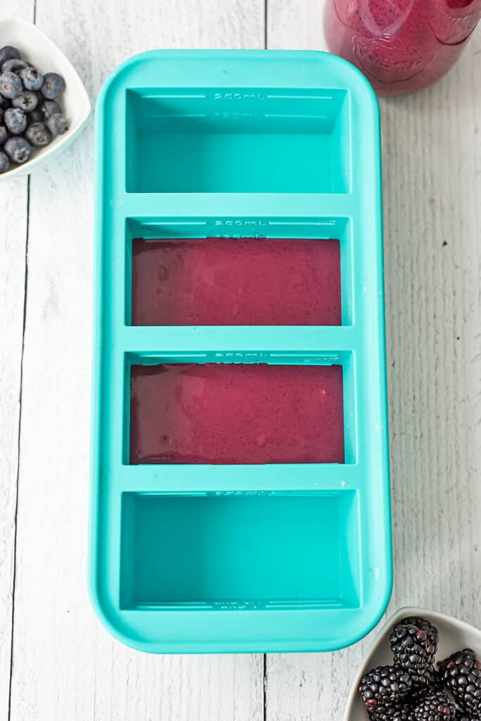Smoothie meal prep using soupercubes to freeze freshly blended smoothie.