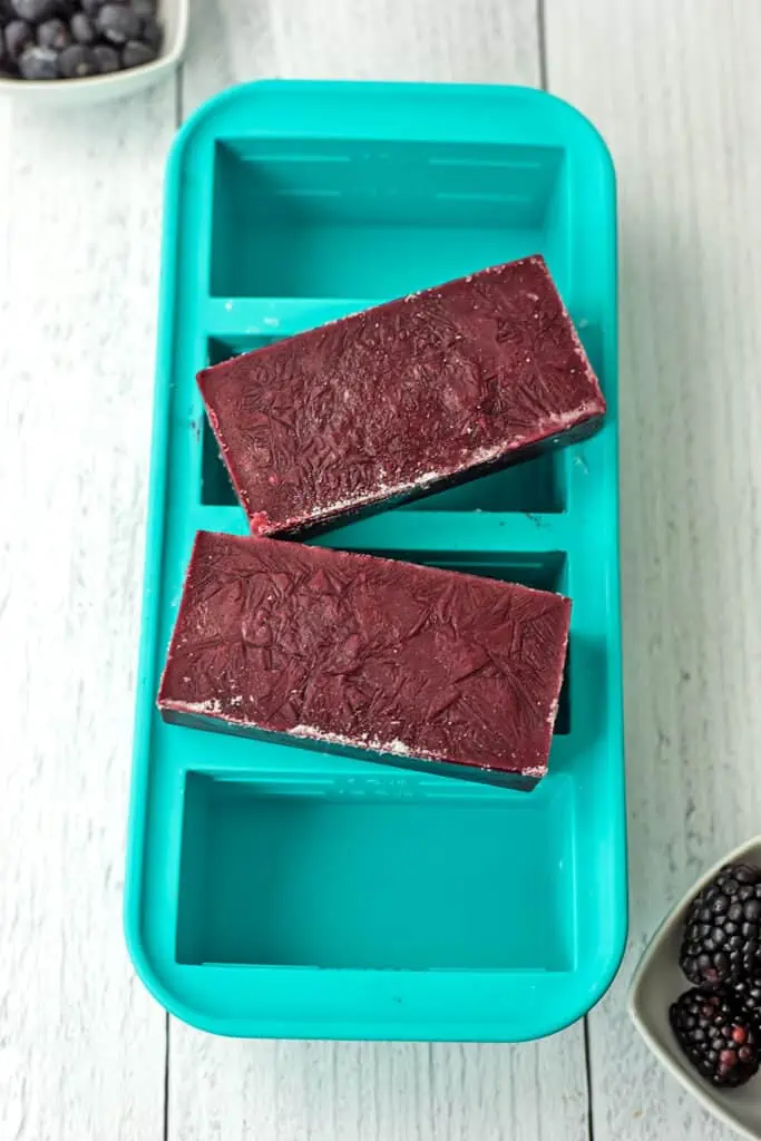 Frozen smoothie in a soupercube freezer safe silicone tray.