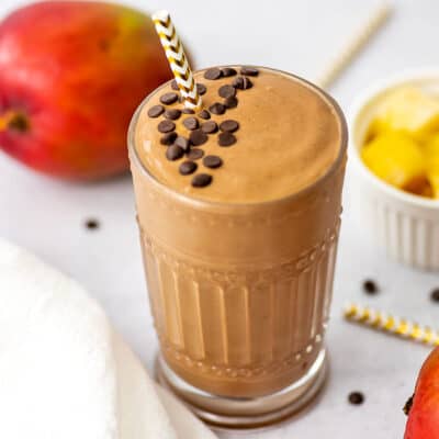Mango chocolate smoothie topped with chocolate chips.