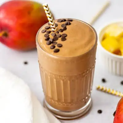Mango chocolate smoothie topped with chocolate chips.