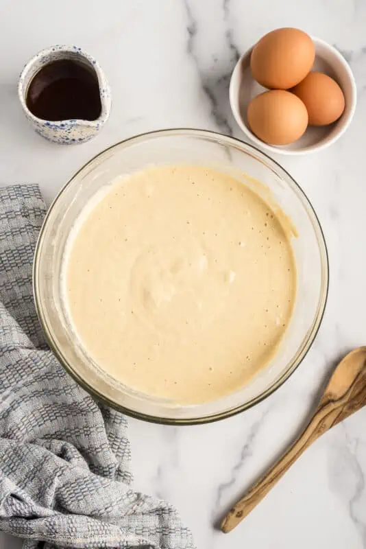 Pancake batter after mixing in glass bowl.