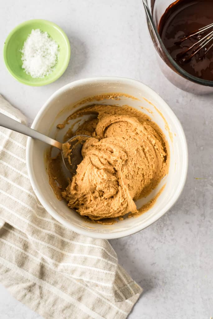 Peanut butter protein filling after stirring in a bowl.