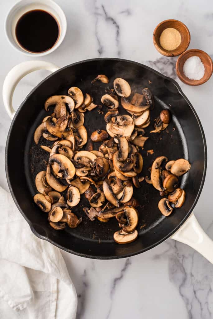 Mushrooms in skillet after sautéing.