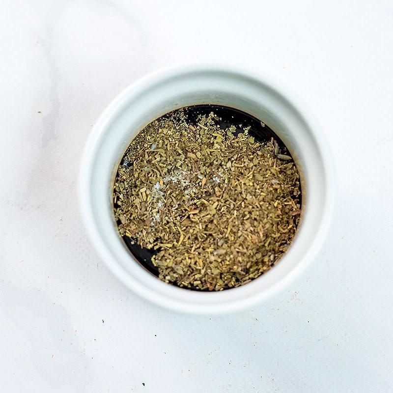 Bowl filled with balsamic marinade. 