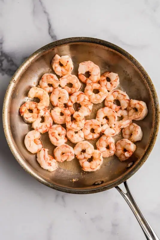 Shrimp in a stainless steel pan.