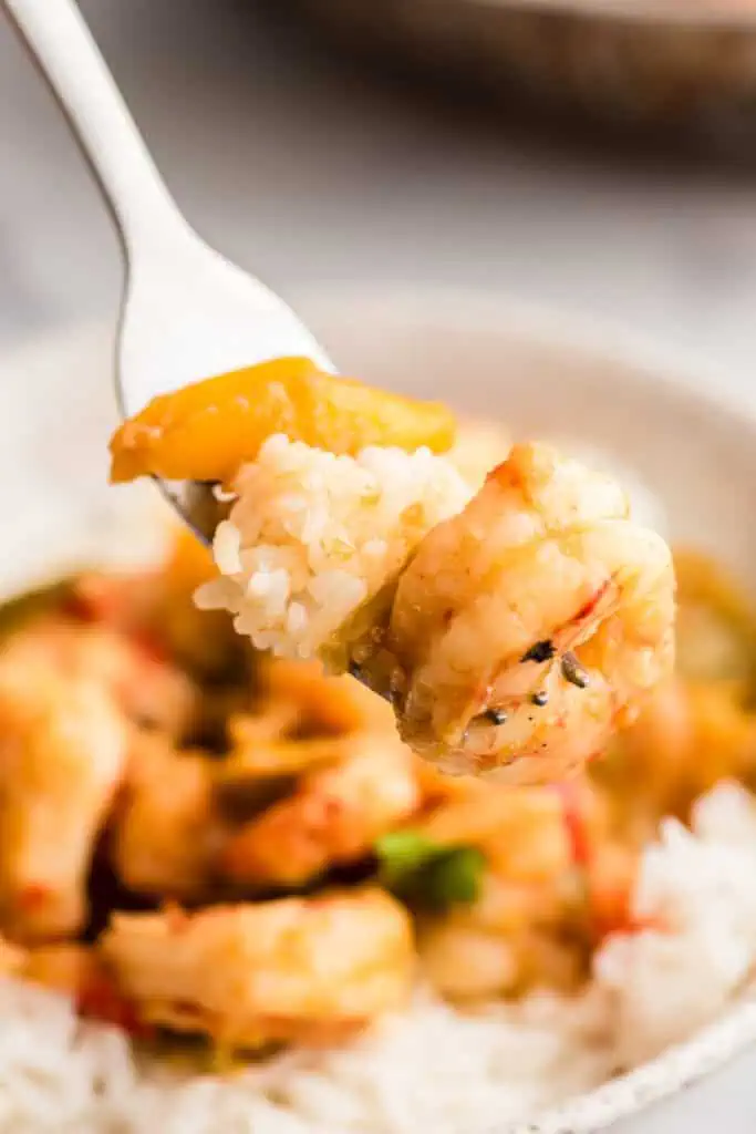 Salsa verde shrimp and rice on a fork