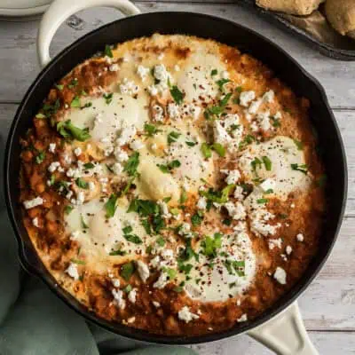 Chickpea shakshuka in a cast iron skillet.